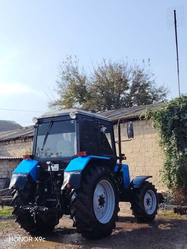 yük avtomobilləri: MTZ Belarus 1025.2 traktor Xüsusiyyətlər: - Model: MTZ Belarus 1025.2 — 5