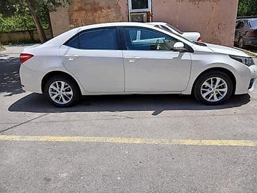 Toyota Corolla: 1.6 l | 2014 il Sedan — 6