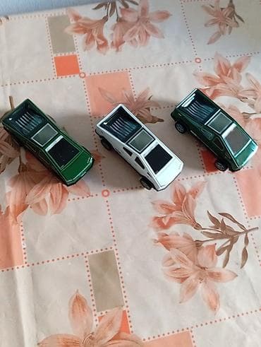 depozitli masinlar: Ilon Maskin balaca plastmasli pikap avtomobil modelləri (elektrik — 2