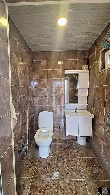 Daşınmaz əmlak: 3 otaqlı mənzil – geniş zal, iki yataq otağı və ayrı mətbəx — 6