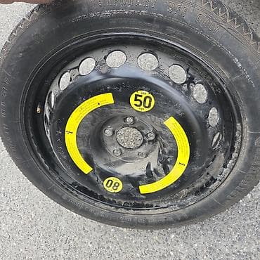 Колеса в сборе: Məhsul: Avtomobil üçün ehtiyat “donut” təkər və polad disk komplekti — 1