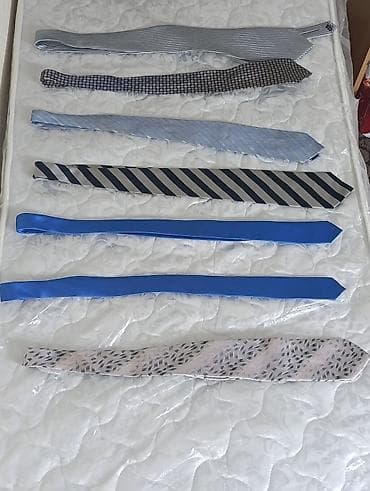 kurtka satışı: Kişi üçün az geyilmiş (istifade olunmuş) qalstuklar satılır. 7 denedi — 7