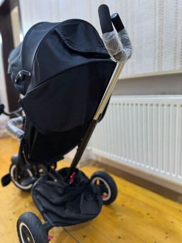 универсальные трехколесные коляски: Трехколесная коляска — 2