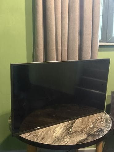 100 cc mator: Televizor Neos LED ekran 40" — 1