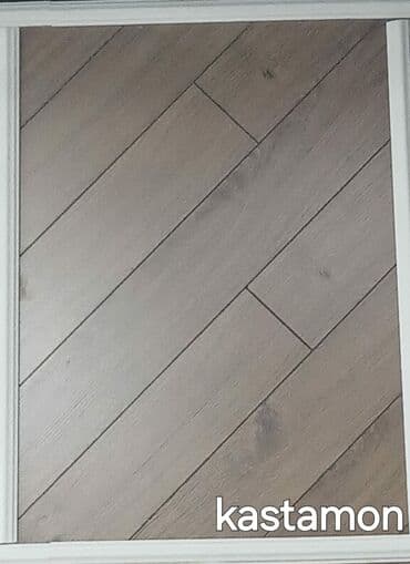 Açıq qəhvəyi rəngdə, balıq qabırğası üslubunda döşəmə örtüyü