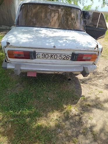 ucuz masnlar: VAZ 2106, ağ rəng, 4 qapılı sedan. Texniki və xarici xüsusiyyətlər: - — 2