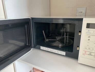 холодильник для автомобиля: Микроволновка Samsung, Отдельностоящая, цвет - Черный, Новый — 2