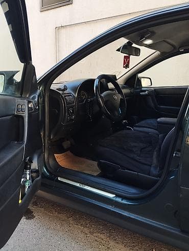 lada vaz 2101: Opel Astra: 1.6 l | 1999 il 400 km Sedan — 4
