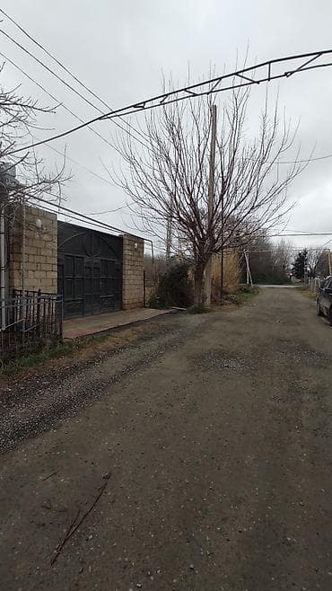 Həyət evi alıram: Satışa çıxarılan şəmkir kür qəsəbəsində həyət evi və torpaq sahəsi — 1