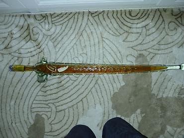 liq: Məhsul: Qılınc formalı şüşə butulka – içində konyak (Ararat etiketi — 2