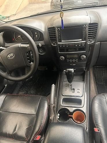 et mawini toknan: Kia Sorento: 2.5 l | 2006 il Ofrouder/SUV — 2