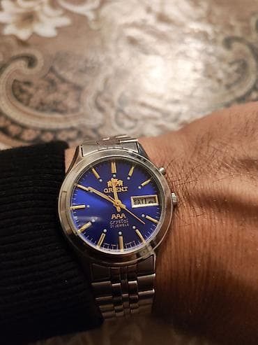 ikinci əl saatlar: Qol saatı, Orient, rəng - Göy — 4