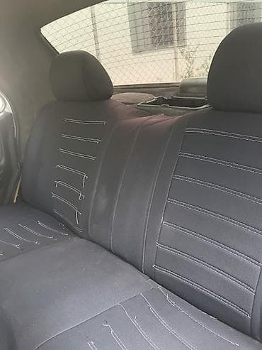 Продажа авто: GAZ Volga 3110, gümüşü rəng. Xüsusiyyətlər: - Kuzov: sedan, geniş — 2