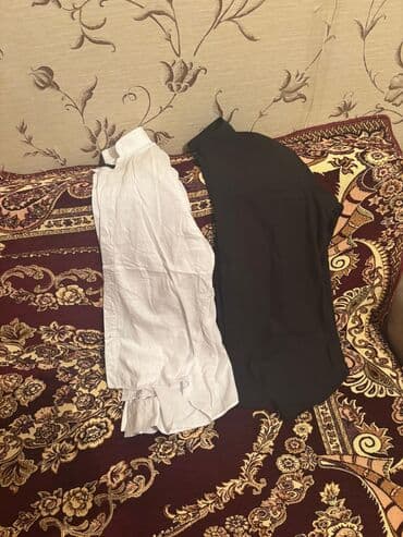 İki ədəd qadın bluz/don üstü: - Rənglər: ağ və qara - Model: uzunqol