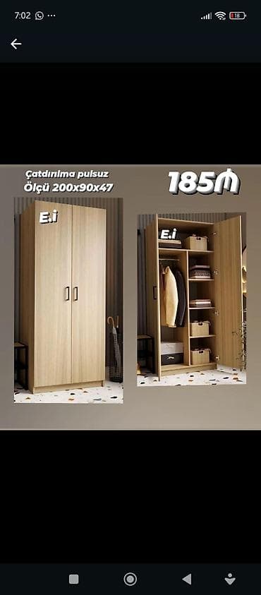 İkiqapılı paltar şkafı, ölçüsü 200x90x47 sm. Şkafın daxilində paltar — 2