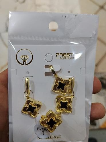 gps saat: Qızılı zərgərlik dəsti - Tərkib: qolbaq, üzük, sırğalar (1 cüt) və — 6