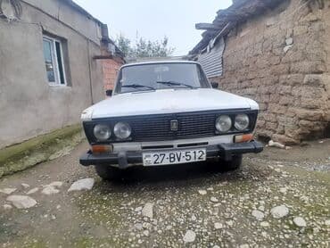 avtomobil ustu cadır: VAZ 2106, ağ rəng, 4 qapı, arxa ötürücülü sedan. Əsas xüsusiyyətlər — 4