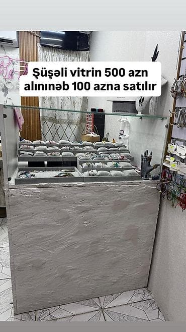 Hazır biznes: Mağaza avadanlıqları satılır: - Eynək vitrini – 90 AZN. Döner stend — 3