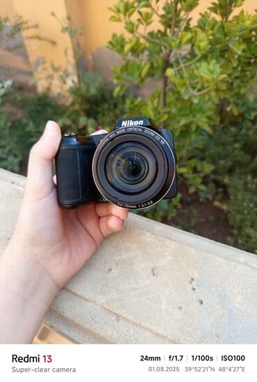 yemek bisiren aparat: Nikon brendinə məxsus qara rəngli fotoaparat, istifadəçilər üçün rahat — 8