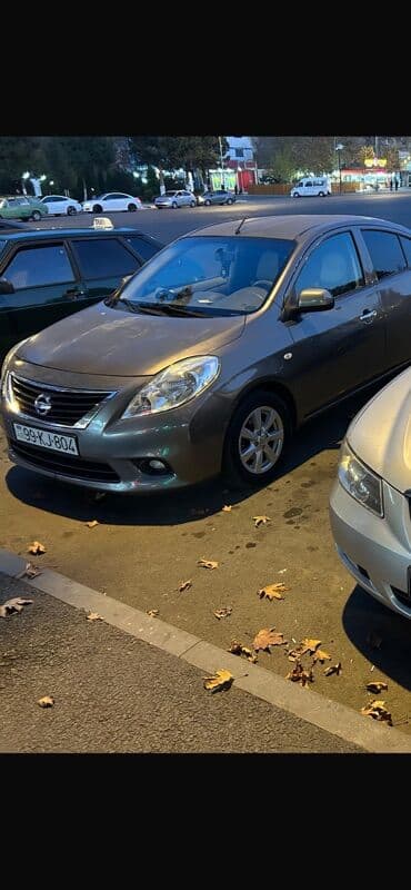 hundayi santa fe: Nissan Almera (sedan), boz rəng. Texniki xüsusiyyətlər: - Benzin — 5