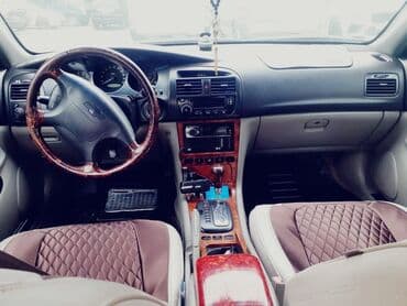 tək oturacaqlar: Chevrolet Evanda: 1.8 l | 2005 il Sedan — 5