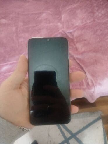 Apple iPhone: Xiaomi Redmi (arxa hissədə “Redmi” loqosu) smartfonu. Xüsusiyyətlər — 2