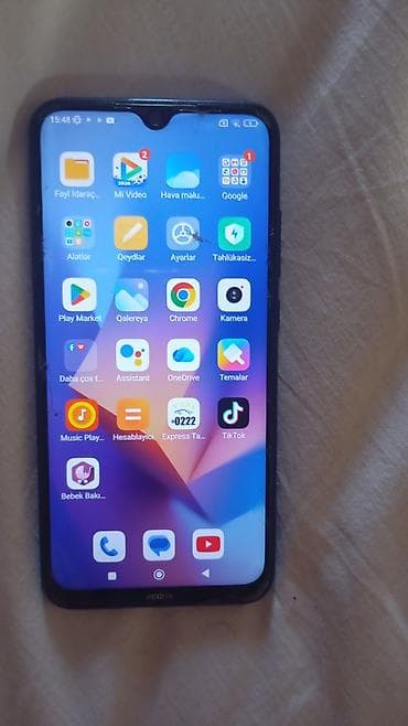 xiaomi redmi note 15 pro plus: Məhsul: Xiaomi Redmi smartfonu (arka tərəfdə “Redmi” loqosu). Rəng — 2