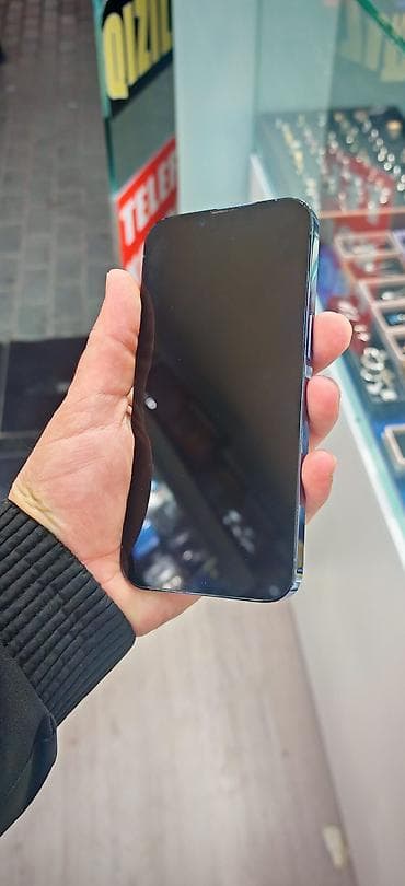 macbook pro: IPhone 13 Pro, 128 GB, Sierra Blue, Face ID — 4