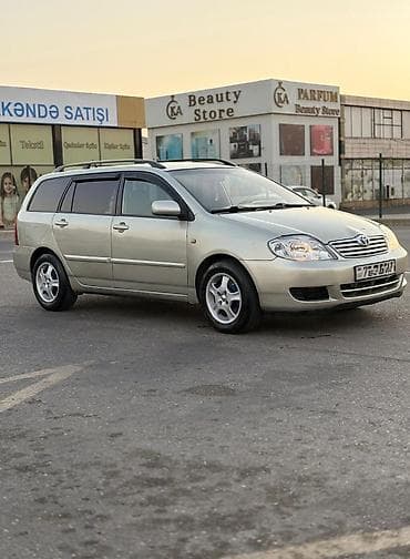 volkswagen polo 1: Toyota Corolla: 1.4 л | 2006 г. Универсал — 2