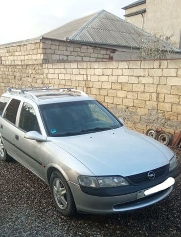 ekskavatör satışı: Opel Vectra Caravan (universal kuzov), gümüşü rəng. - Kuzov: 5 qapı — 2