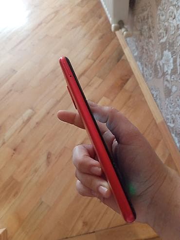 azercell modem internet paketleri: Qırmızı korpuslu smartfon - Ön hissədə damla tipli kamera çıxıntısı — 4