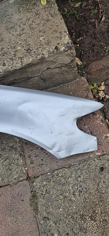 kamaz kuza: Məhsul: Avtomobil kuzov detallarının dəsti Tərkib: - Arxa baqaj — 2