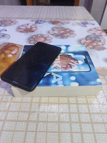 printer 3 u birində: Nokia X6, rəng - Qara, Barmaq izi — 1