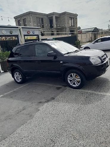 2 teker: Hyundai Tucson: 2 l | 2005 il Ofrouder/SUV — 4