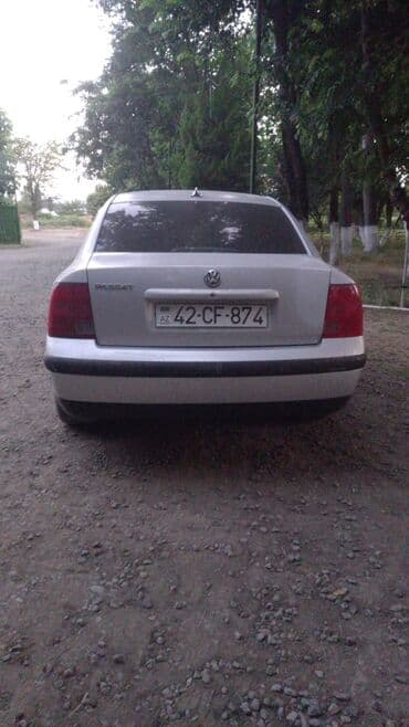 опель зафира а: Volkswagen Passat: 1.6 l | 1999 il Sedan — 2
