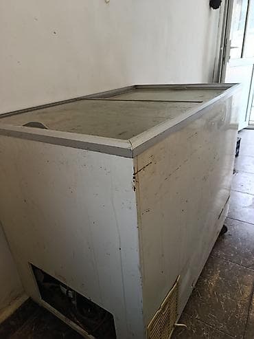 Кухонные вытяжки: Стеклянный морозильник — 2