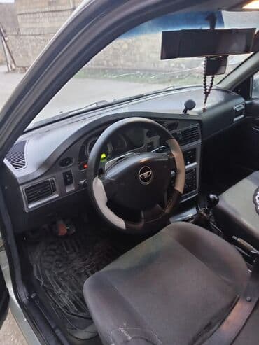 lider diskləri 07: Daewoo Nexia: 1.5 l | 2009 il Sedan — 5