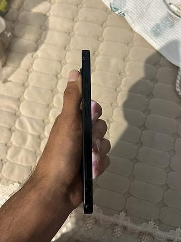 philips xenium 9@9d: IPhone 15, 128 GB, Qara, Face ID — 4