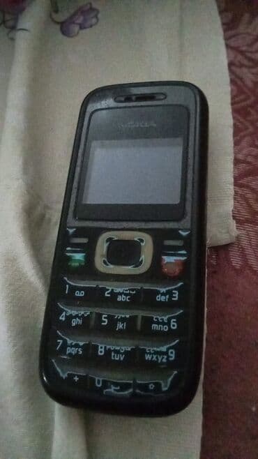 телефоны fly era nano 3: Nokia 106, цвет - Черный, Кнопочный — 1