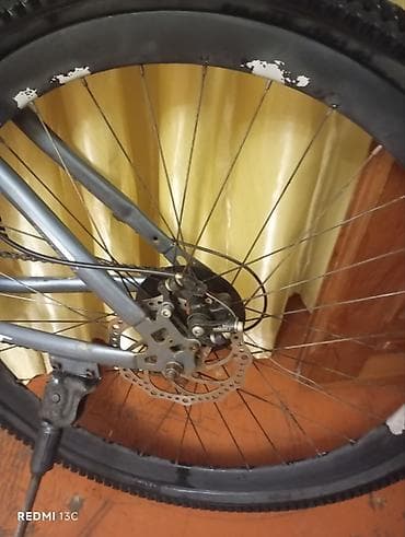 Velosiped ehtiyyat hissələri: Təkərlər: iri dişli off-road protektorlu, 29" sinfinə yaxın böyük ölçü — 7