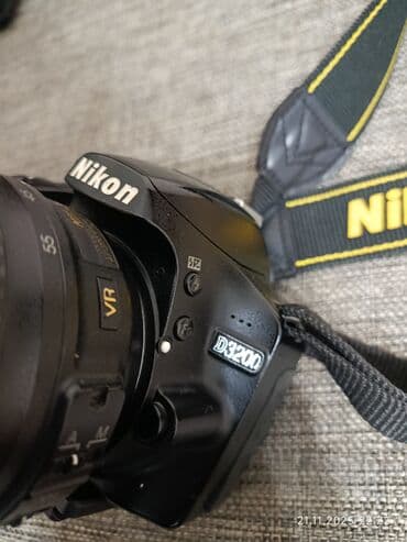 nikon fotoaparati: Nikon yaxşı vəziyyətdədir ustunda cexol ve ehtiyat batareyada verilir — 4