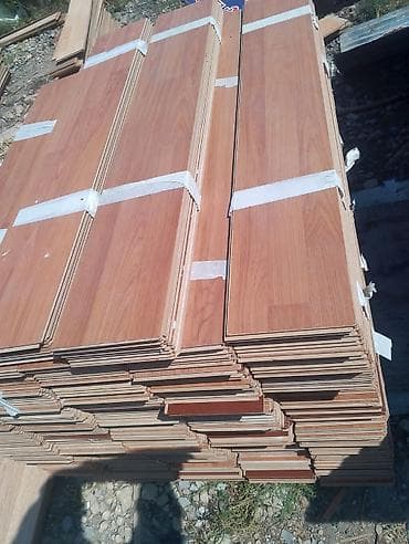 Tahirə xanım . Laminat 200 kv yaxin 2 rəngdir bir kv 7.50 man satılir — 3
