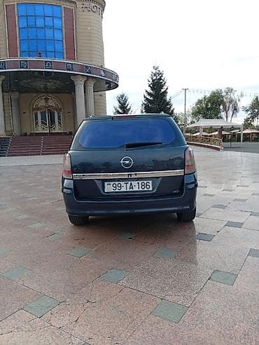 winda teker evi: Opel Astra H Caravan (universal kuzov) - Kuzov: universal, 5 qapı - — 7
