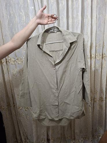 Yaşıl xaki rənglidi. Geyinilib. Ölçü s, 36dı