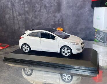 maşın modeli: Коллекционная модель Hyundai i30 5 door white 2012 Pino B&D Scale — 15
