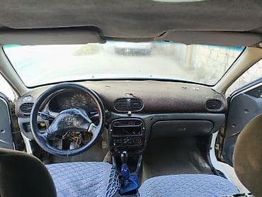 07 stop: Hyundai Accent: 1.5 l | 1995 il Sedan — 6