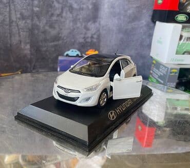 maşın modeli: Коллекционная модель Hyundai i30 5 door white 2012 Pino B&D Scale — 23