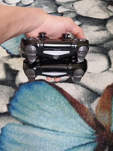 playstation 5 irşad: Məhsul: Sony PlayStation 4 Slim oyun konsolu + 2 ədəd DualShock 4 — 4