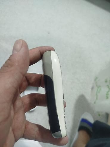 düymeli telefon: Siemens A55 mobil telefon - Klassik monoxrom ekran, narıncı arxa — 4