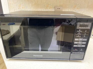 Mikrodalğalı soba Panasonic, Ayrıca dayanan, Mikrodalğalar ilə, rəng - Qara, İşlənmiş